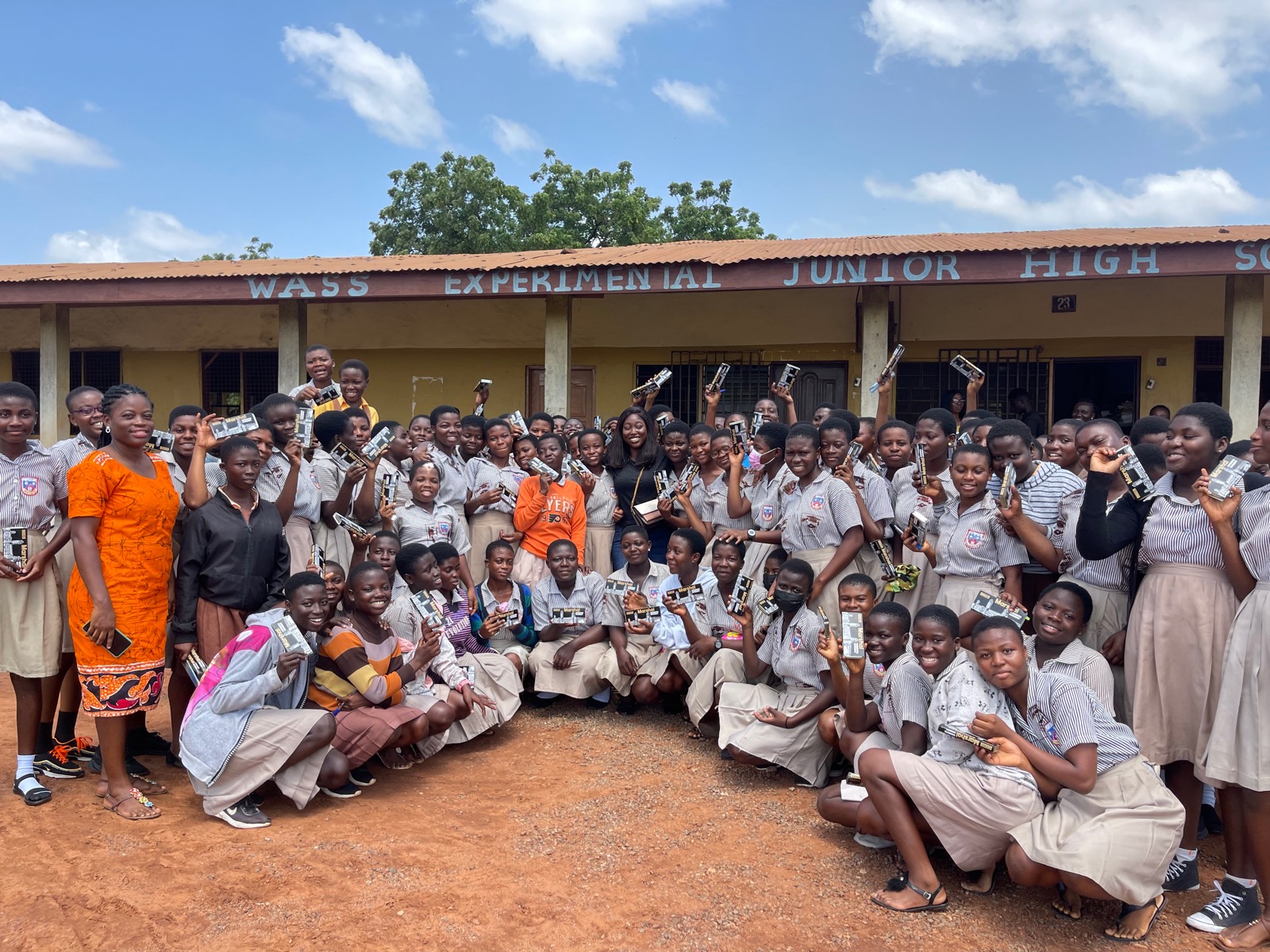 Schoolgirls receiving sanitary and educational materials
