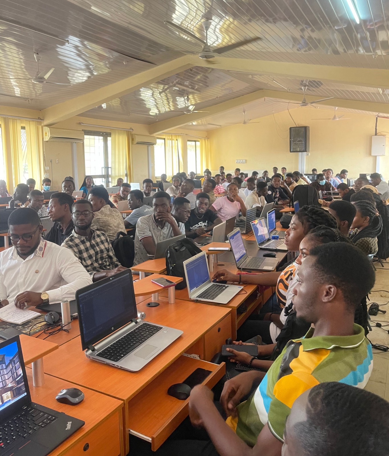 A computer lab full of students learning digital skills