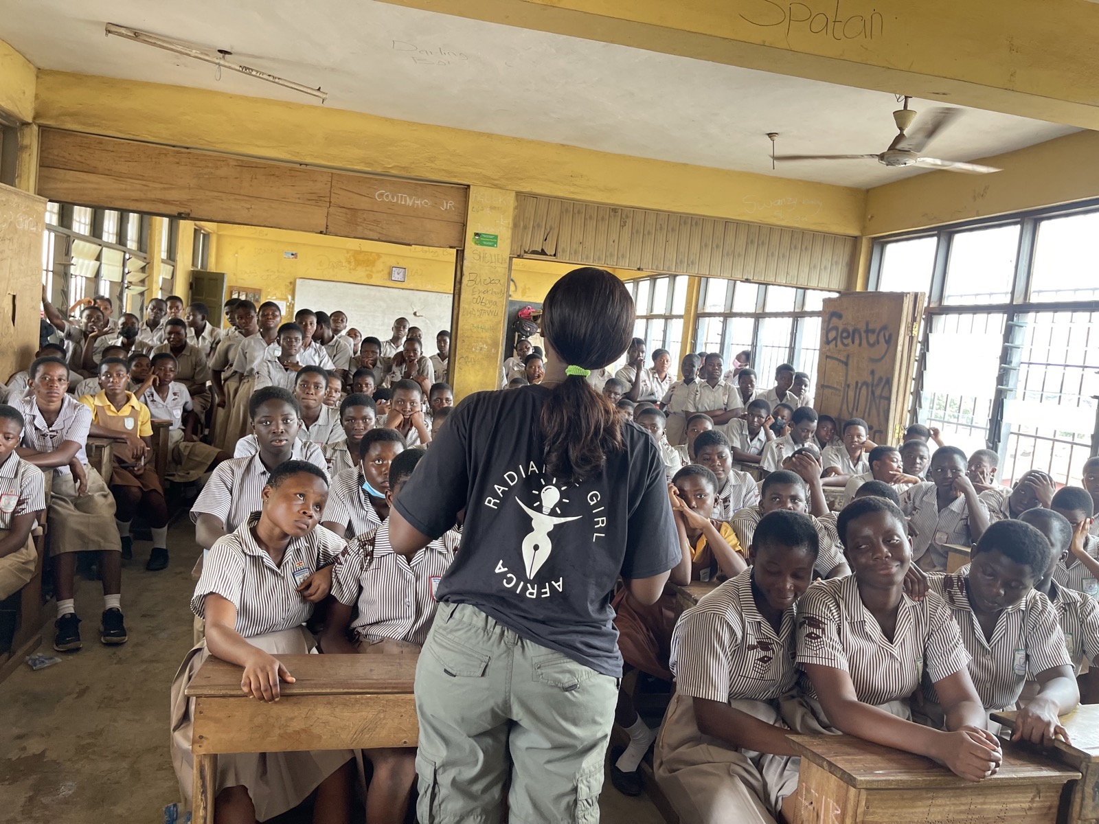 Karen-Happuch speaking to a classroom of students during a Radiance Girl Africa school visit